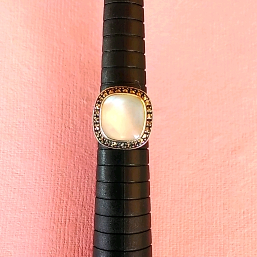 Sterling silver and mother of pearl ring.